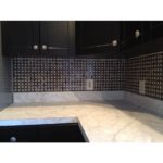 Basket Weave Dark Emperador With Crema Marfil Dot Polished