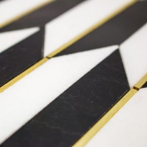Polarized Brass Line With White Thassos  Nero Marquina