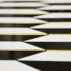 Polarized Brass Line With White Thassos  Nero Marquina